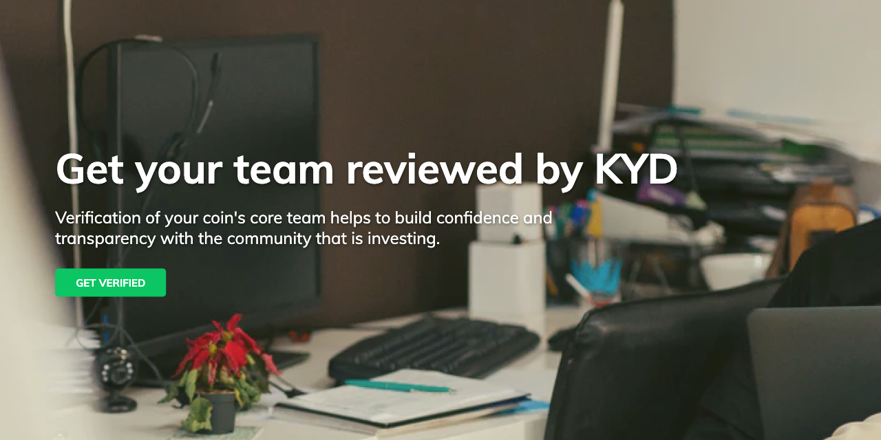 KYD homepage hero with its team-review headline, verification action and workspace photograph